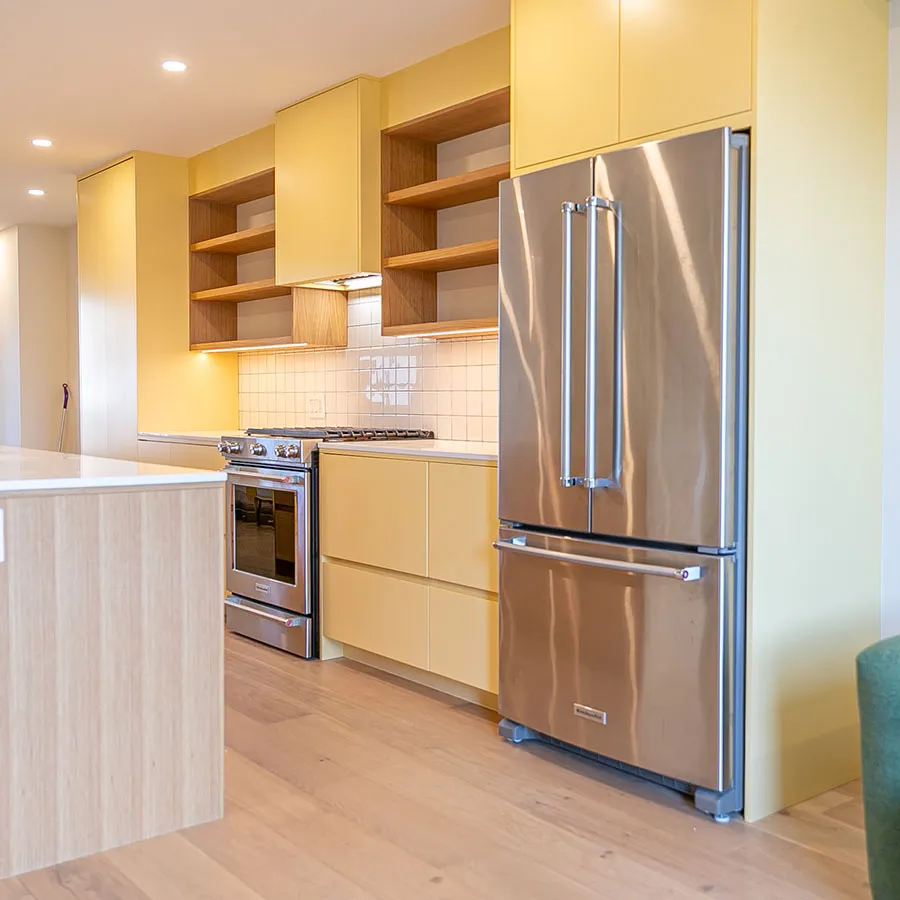 custom kitchen with yellow cabinets