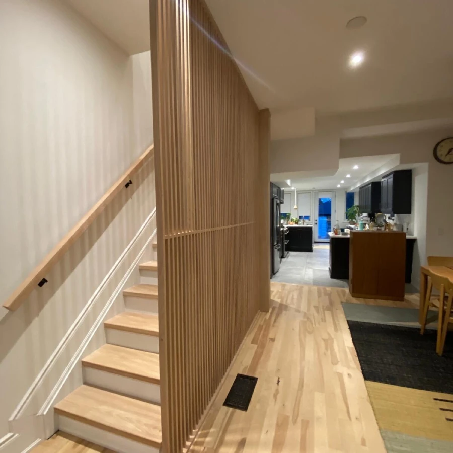 Wood slat staircase wall